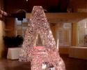 Hand carved letters with a red light steals the show from Louisville Ice Sculptures. Price $275