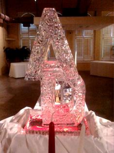 Hand carved letters with a red light steals the show from Louisville Ice Sculptures. Price $275 