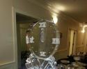 Decorative clock ice sculpture is 32" tall with silver glitter hands.  Price:  $295