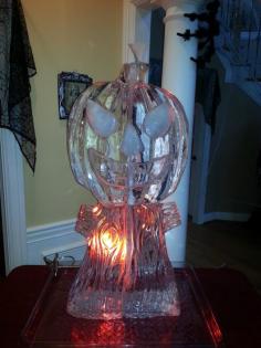 Pumpkin Ice Luge for liquor shots at private holiday event.     Price $295 