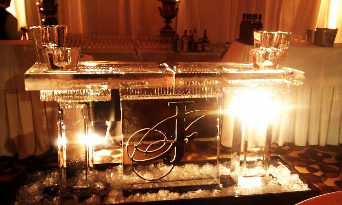 Monogrammed Ice Bar with Champagne Holders and columns. Price $1800