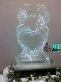 A lovely ice sculpture with a heart surrounded with seahorses that was created by Louisville Ice Sculptures  is a beautiful addition to an event. Price $325